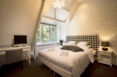 Hotelkamer Koetshuis_Landgoed Huize Bergen.jpg Hotelkamer Koetshuis_Landgoed Huize Bergen.jpg